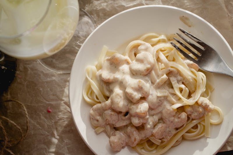 Fettuccine Alfredo with creamy white sauce and parmesan